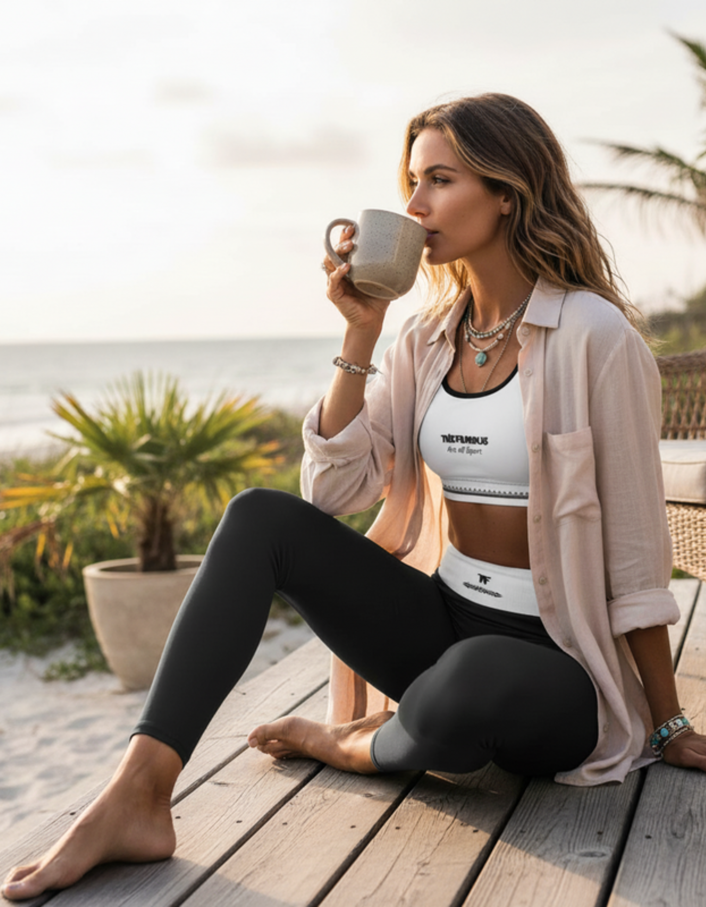 Activewear for women. White padded sport bra and black & white Leggings with TheFamous signature