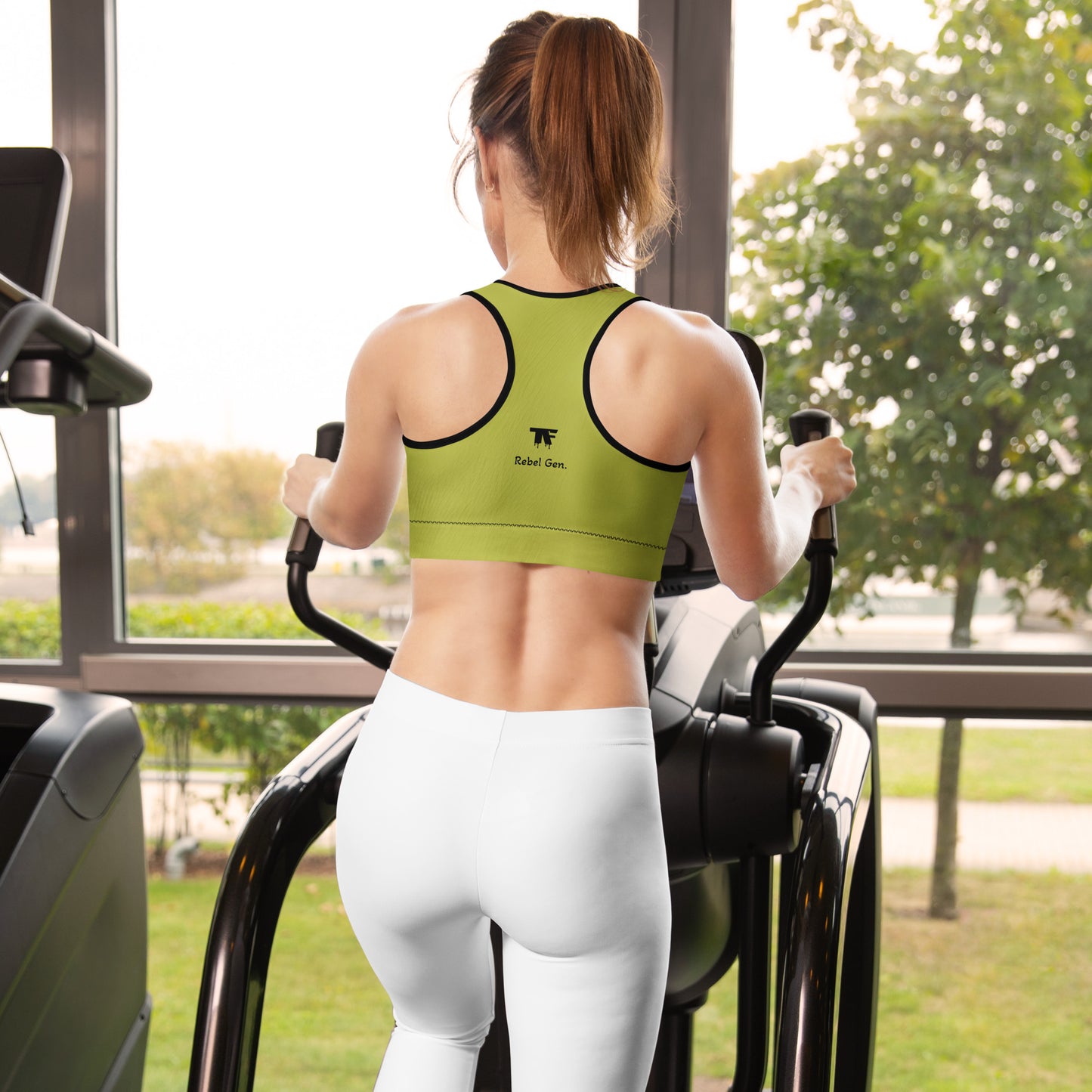 Activewear for women. surf inspired padded sport bra burgundy and anis with a surf vibe tattoo