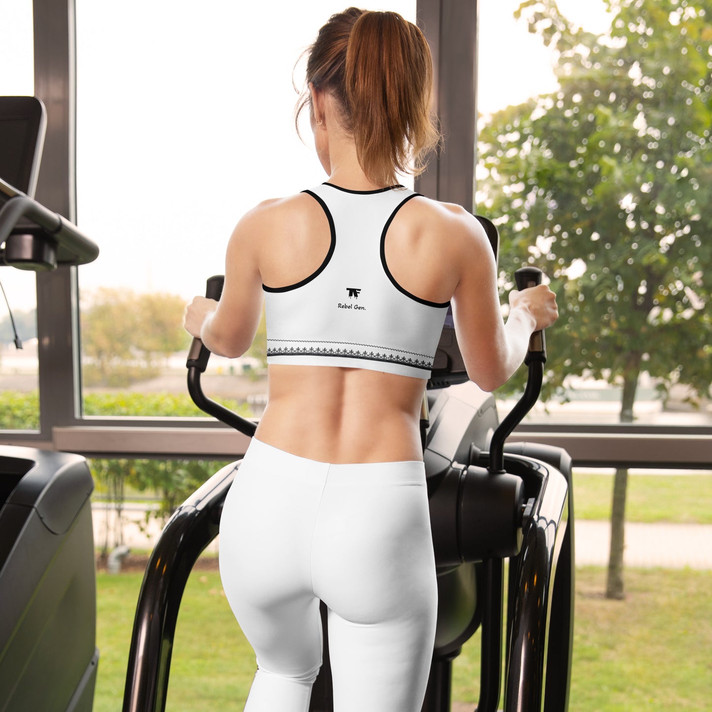 Activewear for women. White padded sport bra with TheFamous signature. Back view