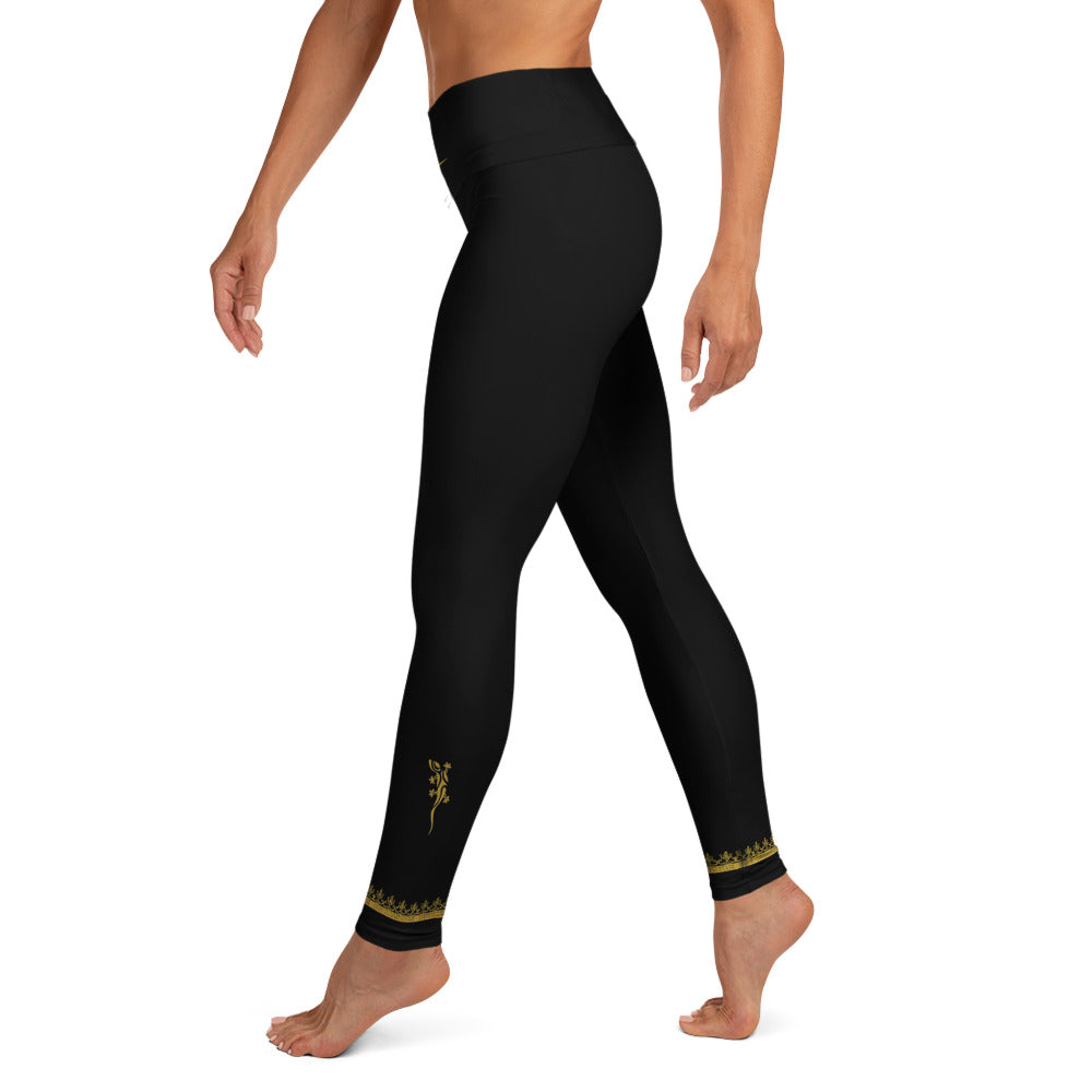 Activewear for women. Black High waisted yoga leggings with gold tattoo. Exclusive athleisure piece for women with a luxury feel and comfort fit.