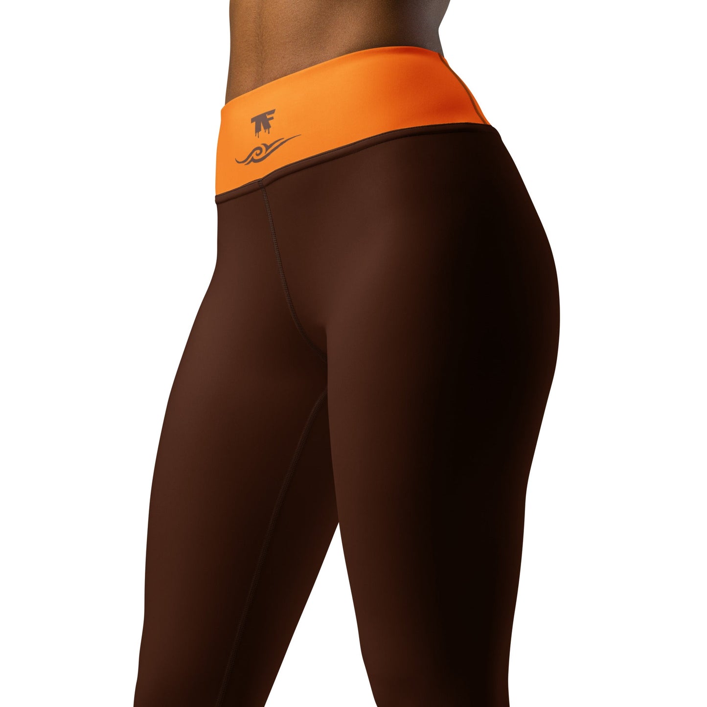 Activewear for women. Athleisure limited edition brown leggings with an orange waist and surfer tattoos.