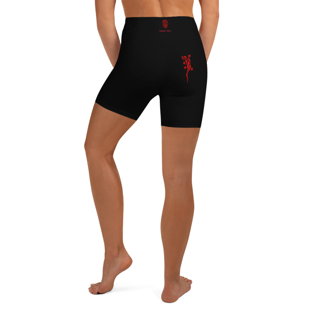 Activewear for women. High raise black short with red tags .