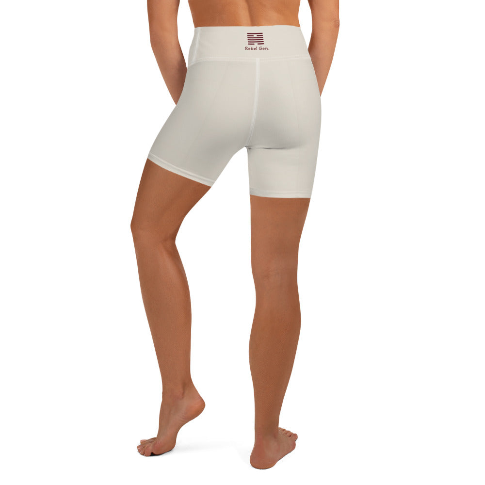 Activewear for women. High waisted shorts beige with burgundy tattoos. Limited editions.