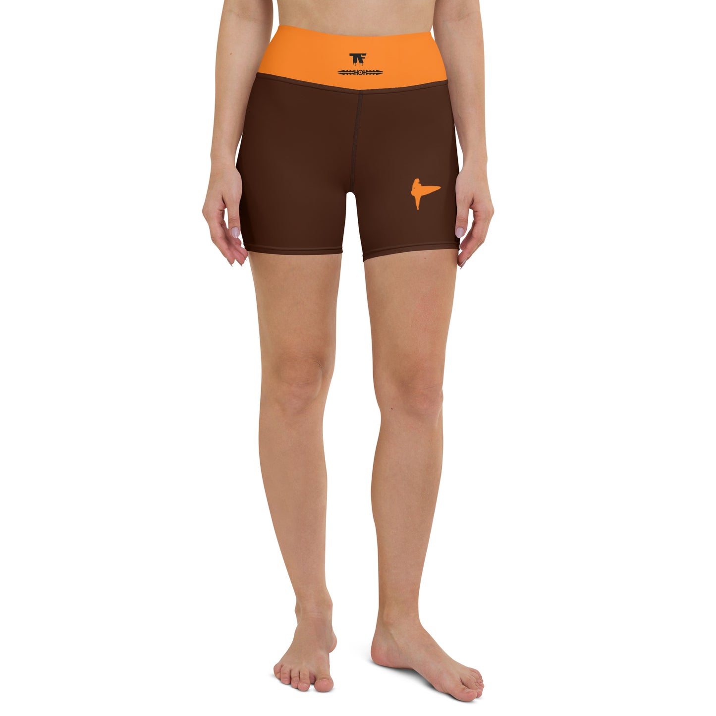 Activewear for women. High waisted shorts brown and orange with surf tattoos