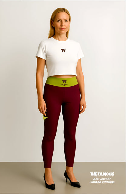Activewear for women. Luxury Burgundy limited edition leggings with an anis waist and surfer tattoos.