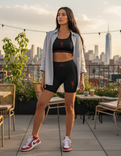 Activewear for women. High raise black short with red tags .