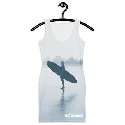 Activewear for women. white vintage streetwear dress with a surfer and her board on the beach as design