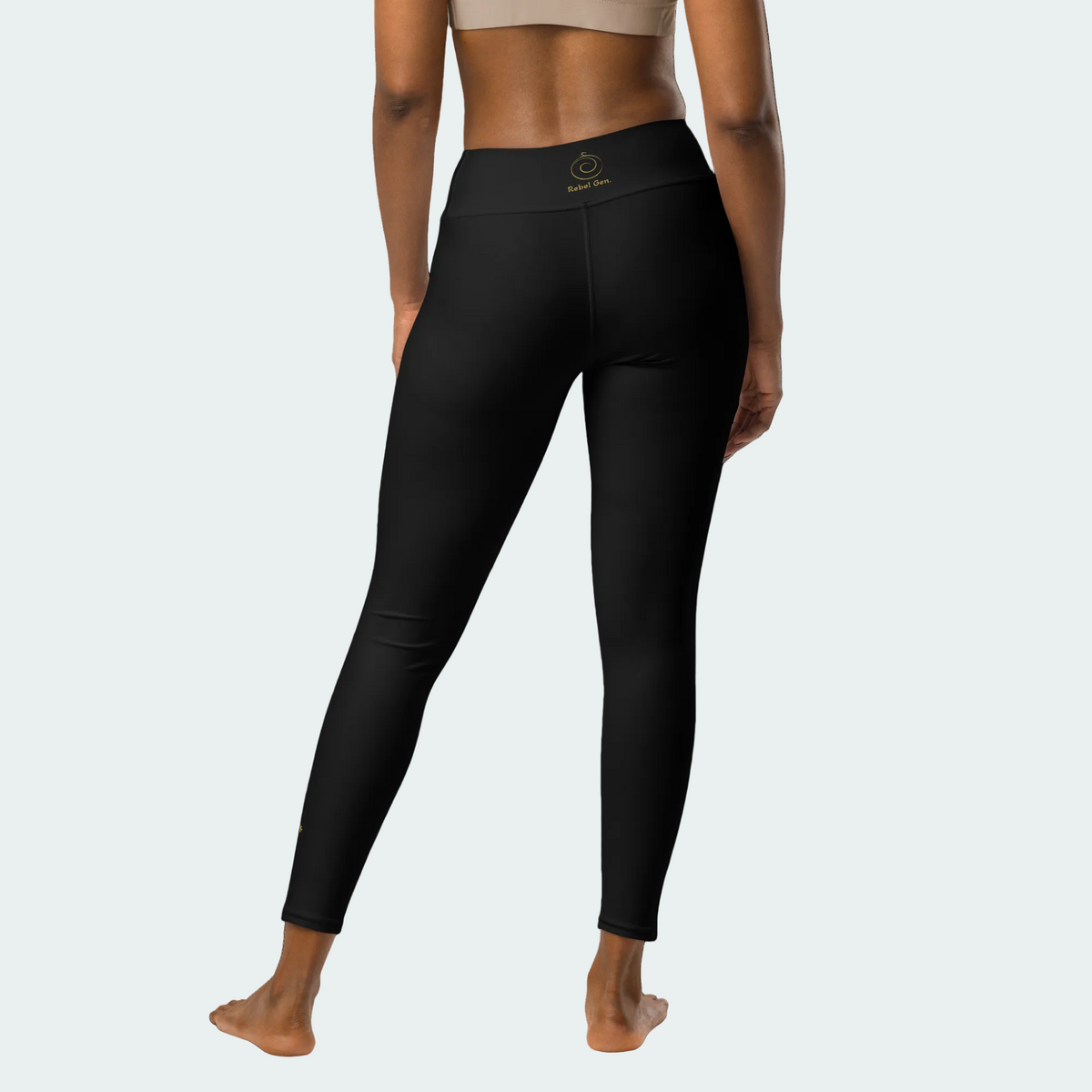 Activewear for women. Black High waisted yoga leggings with gold tattoo. Exclusive athleisure piece for women with a luxury feel and comfort fit.