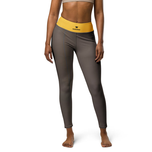 Activewear for women.  High waisted leggings brown and yellow with superb back tattoos. Activewear 2025 trend