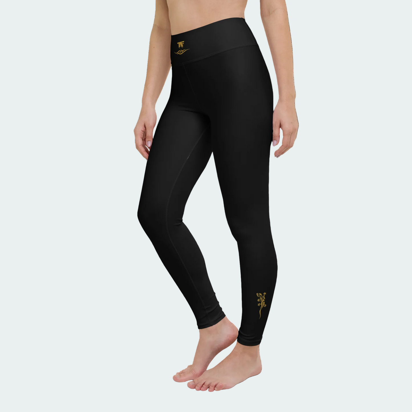 Activewear for women. Black High waisted yoga leggings with gold tattoo. Exclusive athleisure piece for women with a luxury feel and comfort fit.
